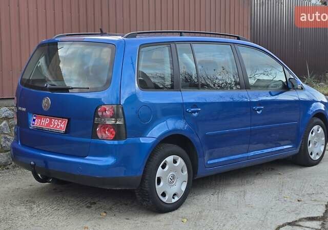 Синий Фольксваген Туран, объемом двигателя 1.6 л и пробегом 221 тыс. км за 6399 $, фото 18 на Automoto.ua