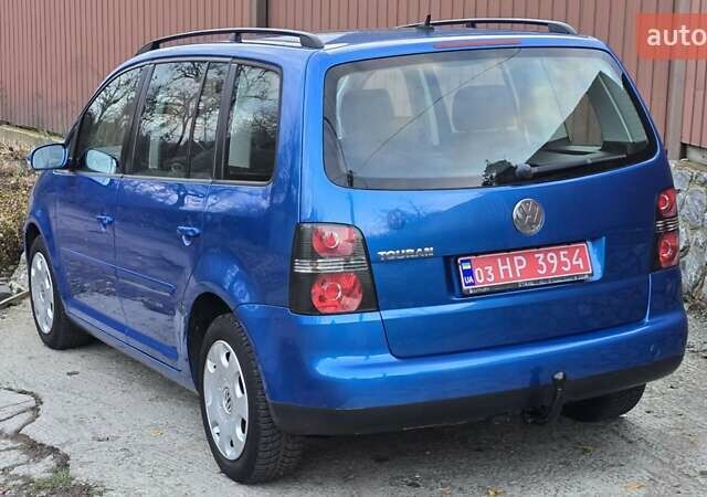 Синий Фольксваген Туран, объемом двигателя 1.6 л и пробегом 221 тыс. км за 6399 $, фото 25 на Automoto.ua