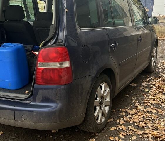 Синий Фольксваген Туран, объемом двигателя 2 л и пробегом 500 тыс. км за 3000 $, фото 3 на Automoto.ua