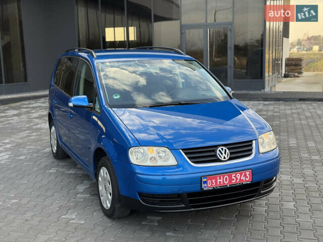 Синий Фольксваген Туран, объемом двигателя 1.6 л и пробегом 250 тыс. км за 5450 $, фото 5 на Automoto.ua