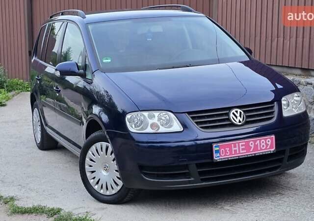 Синий Фольксваген Туран, объемом двигателя 1.6 л и пробегом 262 тыс. км за 6499 $, фото 8 на Automoto.ua