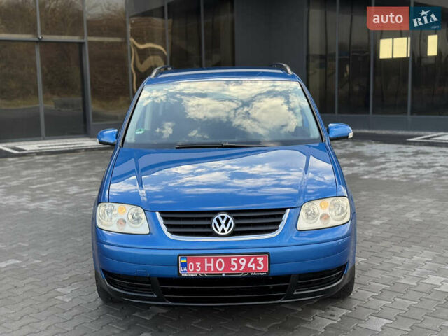 Синий Фольксваген Туран, объемом двигателя 1.6 л и пробегом 250 тыс. км за 5450 $, фото 6 на Automoto.ua