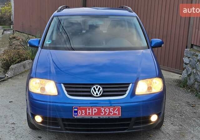 Синий Фольксваген Туран, объемом двигателя 1.6 л и пробегом 221 тыс. км за 6399 $, фото 5 на Automoto.ua