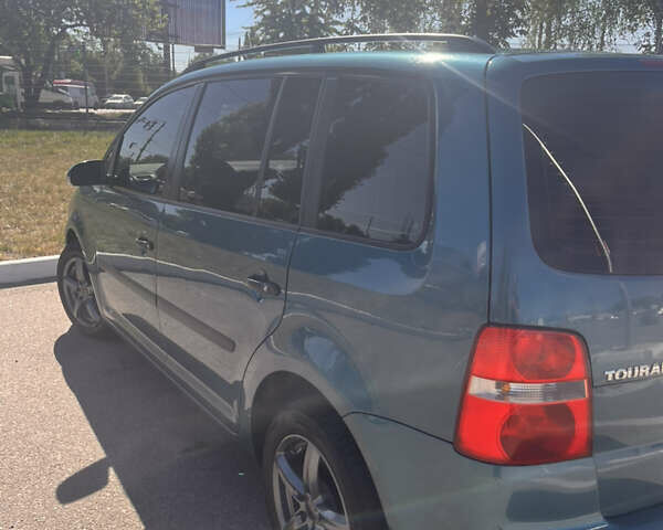 Синій Фольксваген Туран, об'ємом двигуна 1.6 л та пробігом 300 тис. км за 5000 $, фото 2 на Automoto.ua