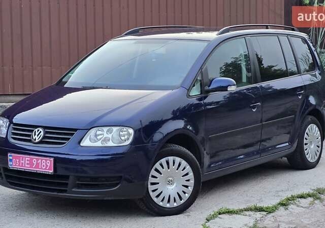 Синий Фольксваген Туран, объемом двигателя 1.6 л и пробегом 262 тыс. км за 6499 $, фото 37 на Automoto.ua