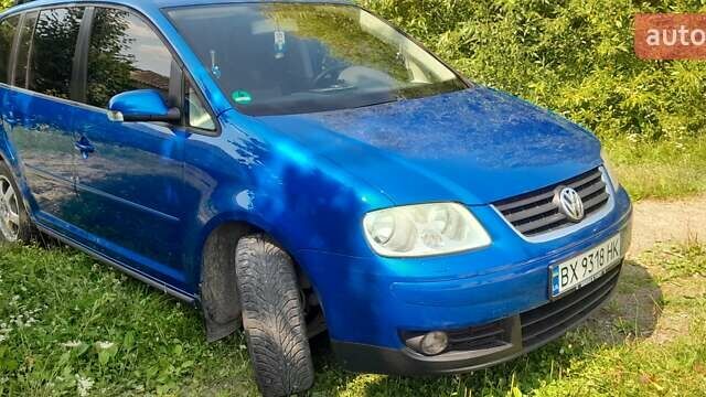 Синий Фольксваген Туран, объемом двигателя 1.6 л и пробегом 271 тыс. км за 5200 $, фото 28 на Automoto.ua