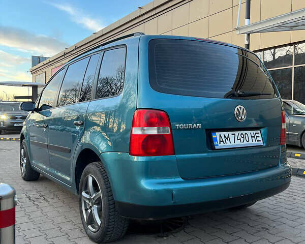 Синій Фольксваген Туран, об'ємом двигуна 1.6 л та пробігом 300 тис. км за 5000 $, фото 6 на Automoto.ua