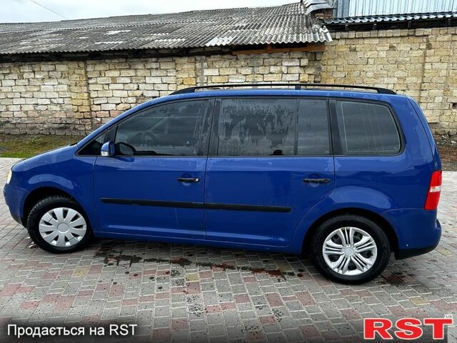 Синій Фольксваген Туран, об'ємом двигуна 1.6 л та пробігом 290 тис. км за 5299 $, фото 5 на Automoto.ua