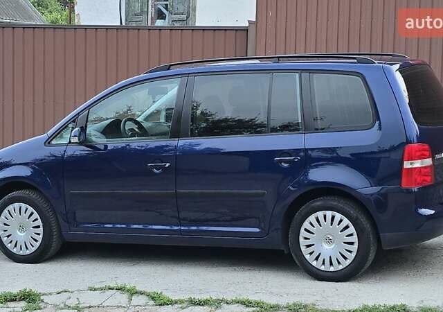 Синий Фольксваген Туран, объемом двигателя 1.6 л и пробегом 262 тыс. км за 6499 $, фото 31 на Automoto.ua