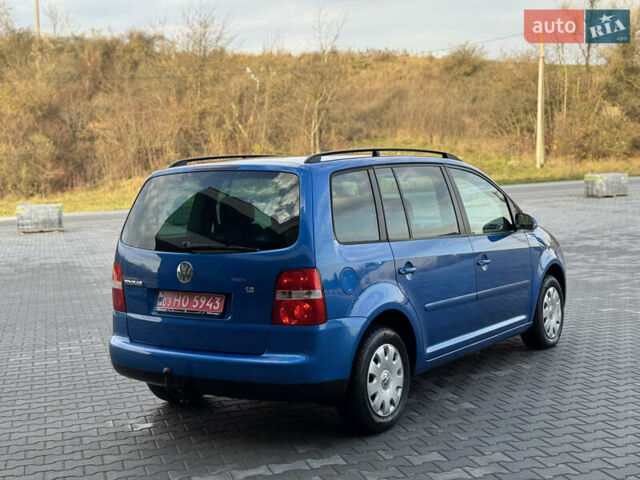 Синий Фольксваген Туран, объемом двигателя 1.6 л и пробегом 250 тыс. км за 5450 $, фото 2 на Automoto.ua