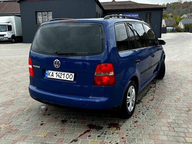 Синій Фольксваген Туран, об'ємом двигуна 1.6 л та пробігом 290 тис. км за 5299 $, фото 1 на Automoto.ua
