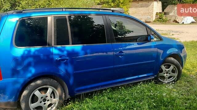 Синий Фольксваген Туран, объемом двигателя 1.6 л и пробегом 271 тыс. км за 5200 $, фото 21 на Automoto.ua