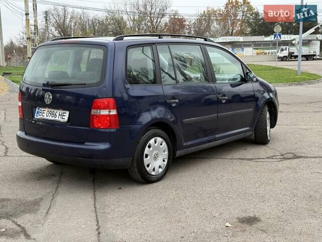 Синий Фольксваген Туран, объемом двигателя 1.6 л и пробегом 246 тыс. км за 5800 $, фото 3 на Automoto.ua