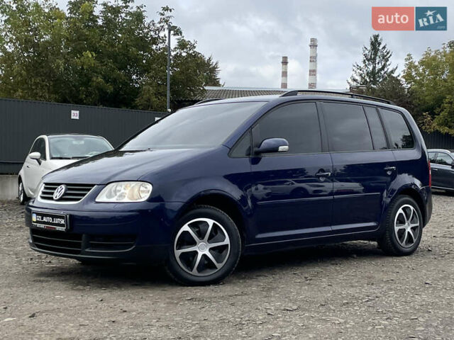 Синий Фольксваген Туран, объемом двигателя 1.6 л и пробегом 233 тыс. км за 6500 $, фото 3 на Automoto.ua
