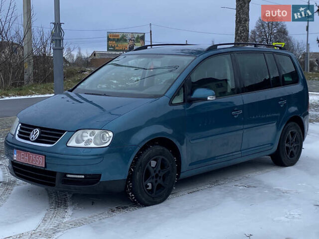 Синий Фольксваген Туран, объемом двигателя 1.6 л и пробегом 186 тыс. км за 6000 $, фото 3 на Automoto.ua