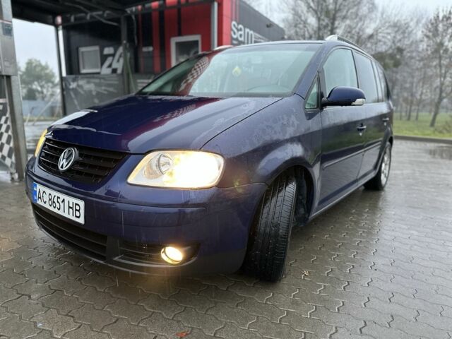 Синий Фольксваген Туран, объемом двигателя 2 л и пробегом 468 тыс. км за 3999 $, фото 2 на Automoto.ua