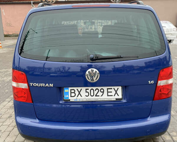 Синий Фольксваген Туран, объемом двигателя 1.6 л и пробегом 199 тыс. км за 6700 $, фото 2 на Automoto.ua