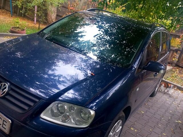 Синий Фольксваген Туран, объемом двигателя 1.6 л и пробегом 220 тыс. км за 6299 $, фото 1 на Automoto.ua