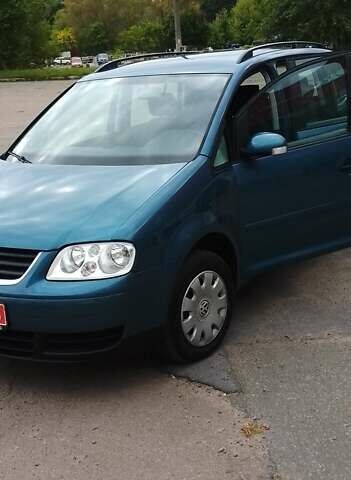 Синий Фольксваген Туран, объемом двигателя 1.6 л и пробегом 180 тыс. км за 6500 $, фото 7 на Automoto.ua