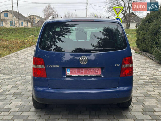 Синій Фольксваген Туран, об'ємом двигуна 1.6 л та пробігом 203 тис. км за 5900 $, фото 5 на Automoto.ua