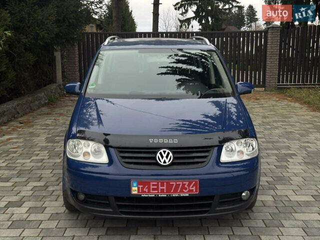 Синій Фольксваген Туран, об'ємом двигуна 1.6 л та пробігом 203 тис. км за 5900 $, фото 1 на Automoto.ua