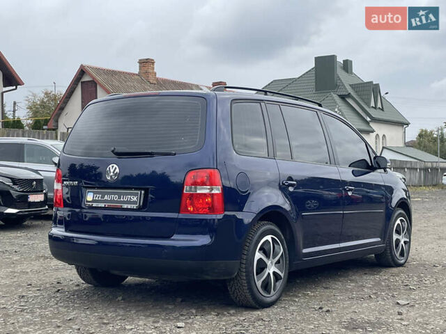 Синий Фольксваген Туран, объемом двигателя 1.6 л и пробегом 233 тыс. км за 6500 $, фото 7 на Automoto.ua