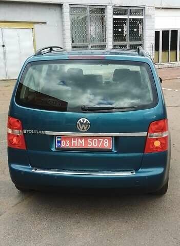 Синий Фольксваген Туран, объемом двигателя 1.6 л и пробегом 180 тыс. км за 6500 $, фото 2 на Automoto.ua