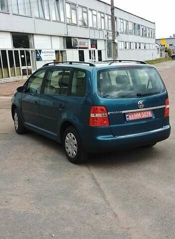 Синий Фольксваген Туран, объемом двигателя 1.6 л и пробегом 180 тыс. км за 6500 $, фото 1 на Automoto.ua