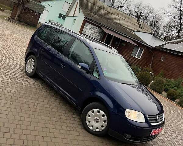 Синий Фольксваген Туран, объемом двигателя 1.6 л и пробегом 204 тыс. км за 6200 $, фото 1 на Automoto.ua