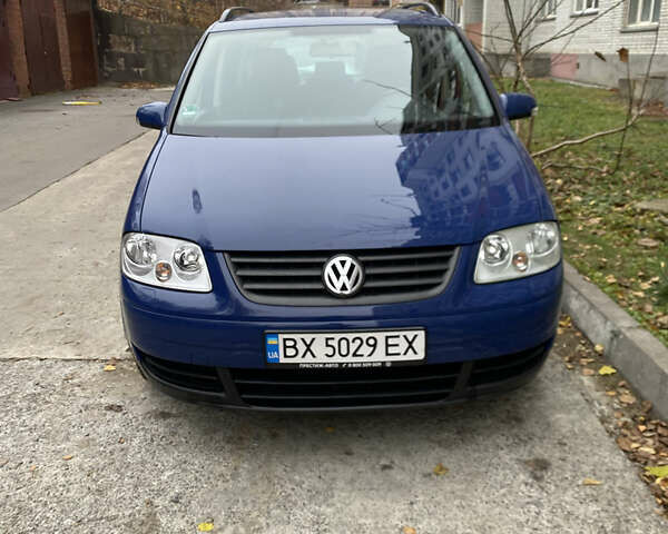 Синий Фольксваген Туран, объемом двигателя 1.6 л и пробегом 199 тыс. км за 6700 $, фото 1 на Automoto.ua