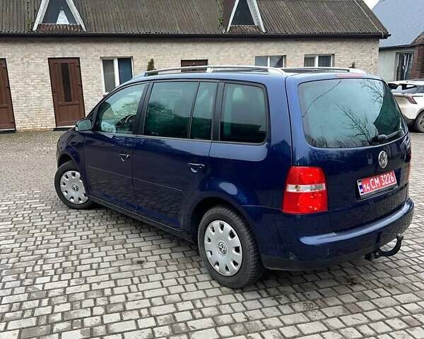 Синий Фольксваген Туран, объемом двигателя 1.6 л и пробегом 204 тыс. км за 6200 $, фото 6 на Automoto.ua