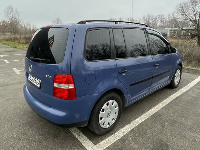 Синий Фольксваген Туран, объемом двигателя 1.9 л и пробегом 253 тыс. км за 5500 $, фото 4 на Automoto.ua