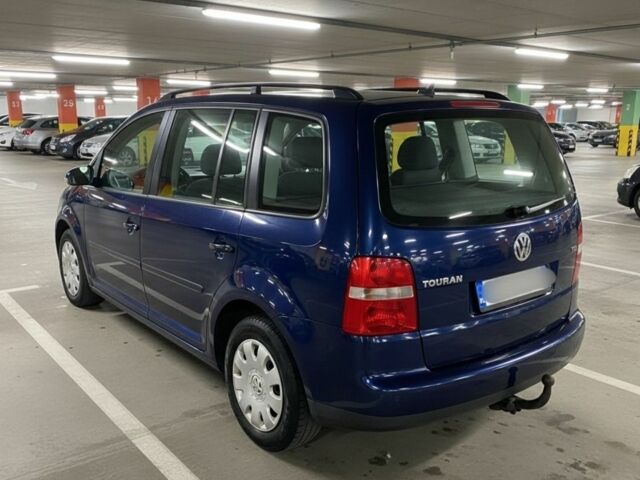 Синий Фольксваген Туран, объемом двигателя 2 л и пробегом 280 тыс. км за 3500 $, фото 2 на Automoto.ua