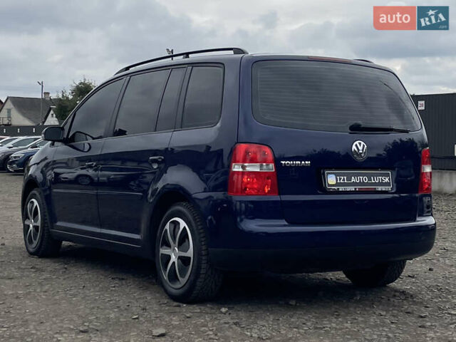 Синий Фольксваген Туран, объемом двигателя 1.6 л и пробегом 233 тыс. км за 6500 $, фото 5 на Automoto.ua