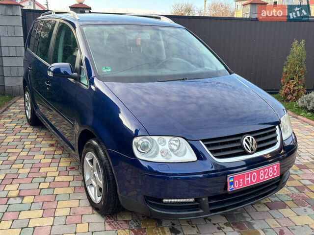 Синий Фольксваген Туран, объемом двигателя 1.6 л и пробегом 251 тыс. км за 6700 $, фото 1 на Automoto.ua