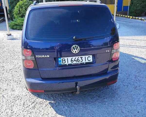 Синий Фольксваген Туран, объемом двигателя 1.39 л и пробегом 241 тыс. км за 6000 $, фото 1 на Automoto.ua