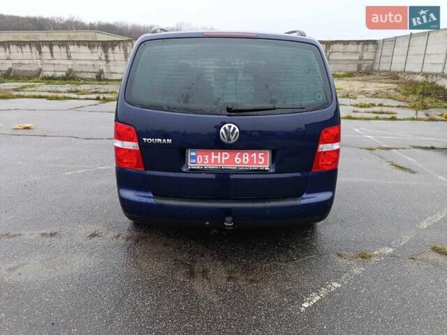 Синий Фольксваген Туран, объемом двигателя 1.6 л и пробегом 227 тыс. км за 5999 $, фото 2 на Automoto.ua