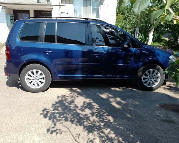 Синій Фольксваген Туран, об'ємом двигуна 1.98 л та пробігом 240 тис. км за 7500 $, фото 6 на Automoto.ua