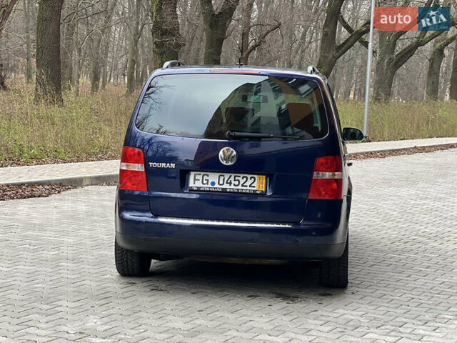 Синій Фольксваген Туран, об'ємом двигуна 1.6 л та пробігом 240 тис. км за 6700 $, фото 19 на Automoto.ua