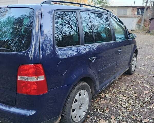 Синий Фольксваген Туран, объемом двигателя 1.6 л и пробегом 223 тыс. км за 6200 $, фото 13 на Automoto.ua