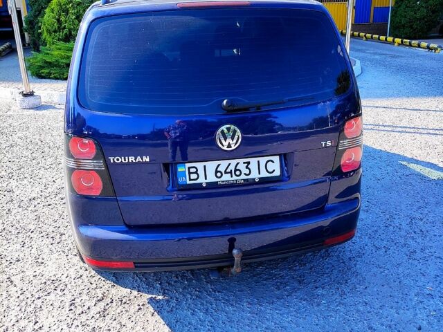 Синий Фольксваген Туран, объемом двигателя 1.4 л и пробегом 241 тыс. км за 6000 $, фото 1 на Automoto.ua