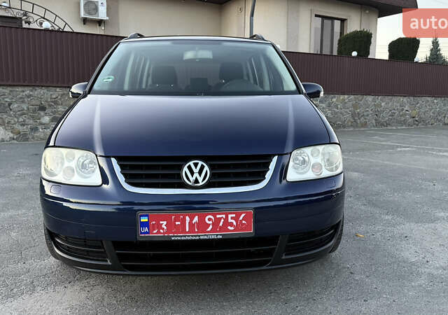 Синій Фольксваген Туран, об'ємом двигуна 1.6 л та пробігом 282 тис. км за 6500 $, фото 2 на Automoto.ua