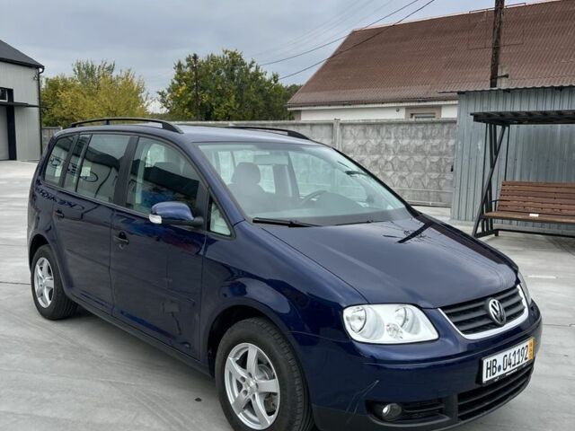 Синий Фольксваген Туран, объемом двигателя 1.6 л и пробегом 247 тыс. км за 7200 $, фото 3 на Automoto.ua