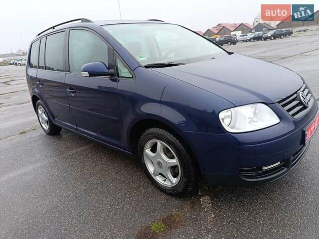 Синий Фольксваген Туран, объемом двигателя 1.6 л и пробегом 227 тыс. км за 5999 $, фото 5 на Automoto.ua