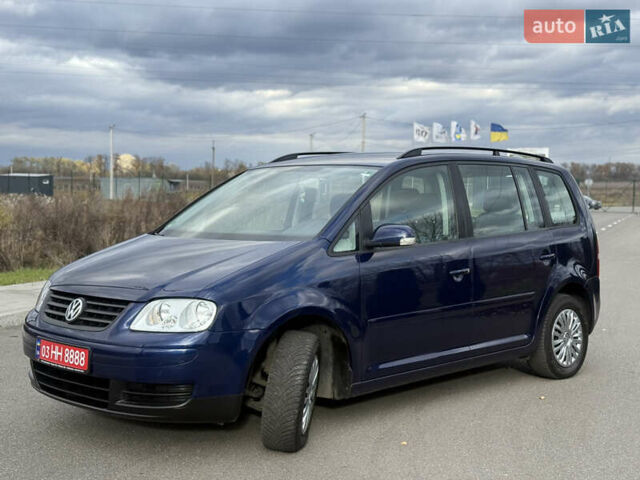 Синій Фольксваген Туран, об'ємом двигуна 1.6 л та пробігом 221 тис. км за 6200 $, фото 2 на Automoto.ua