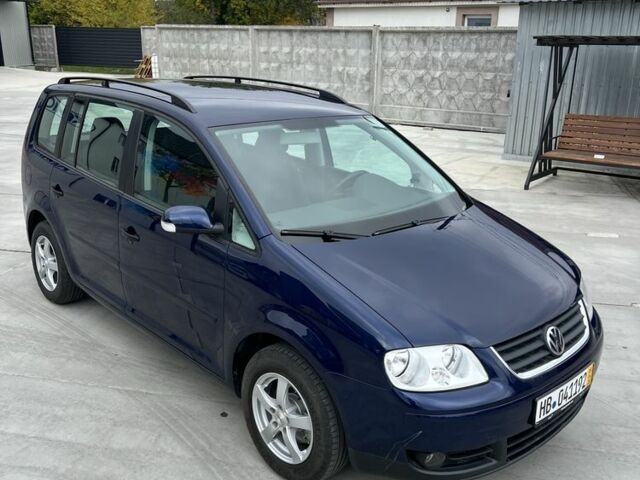Синий Фольксваген Туран, объемом двигателя 1.6 л и пробегом 247 тыс. км за 7200 $, фото 4 на Automoto.ua