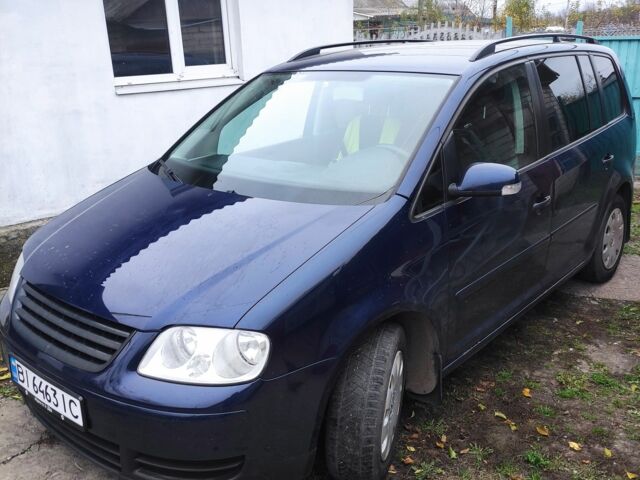 Синій Фольксваген Туран, об'ємом двигуна 1.4 л та пробігом 244 тис. км за 5500 $, фото 8 на Automoto.ua