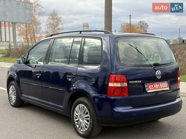 Синій Фольксваген Туран, об'ємом двигуна 1.6 л та пробігом 221 тис. км за 6200 $, фото 19 на Automoto.ua