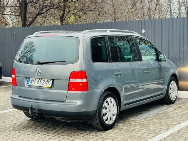 Синий Фольксваген Туран, объемом двигателя 2 л и пробегом 257 тыс. км за 3450 $, фото 4 на Automoto.ua