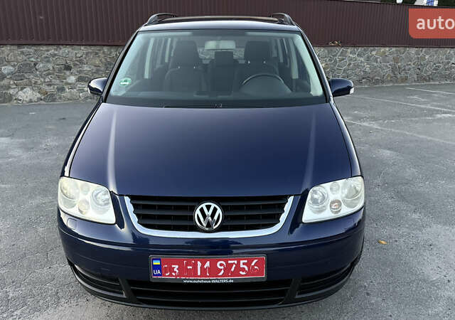 Синій Фольксваген Туран, об'ємом двигуна 1.6 л та пробігом 282 тис. км за 6500 $, фото 1 на Automoto.ua